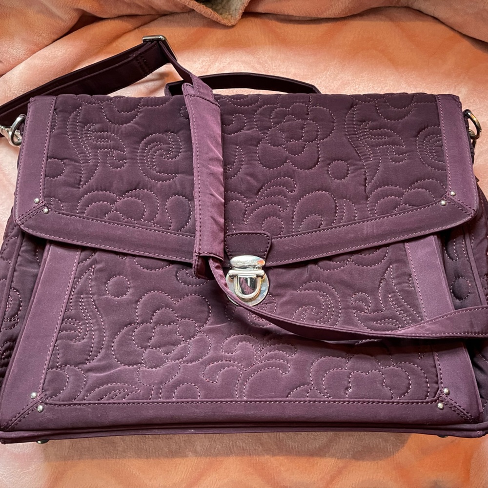 Vera Bradley plum color briefcase! Bought new. Hardly used. No signs of wear!